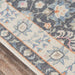 Border of Momeni Anatolia Indoor Rug - ANA-8 Charcoal highlights delicate blue and ivory floral designs with orange accents