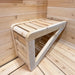 Close-up of the Box Sauna’s pale wooden porch bench with a slatted seat, rounded front edge, and sturdy diagonal support brace.