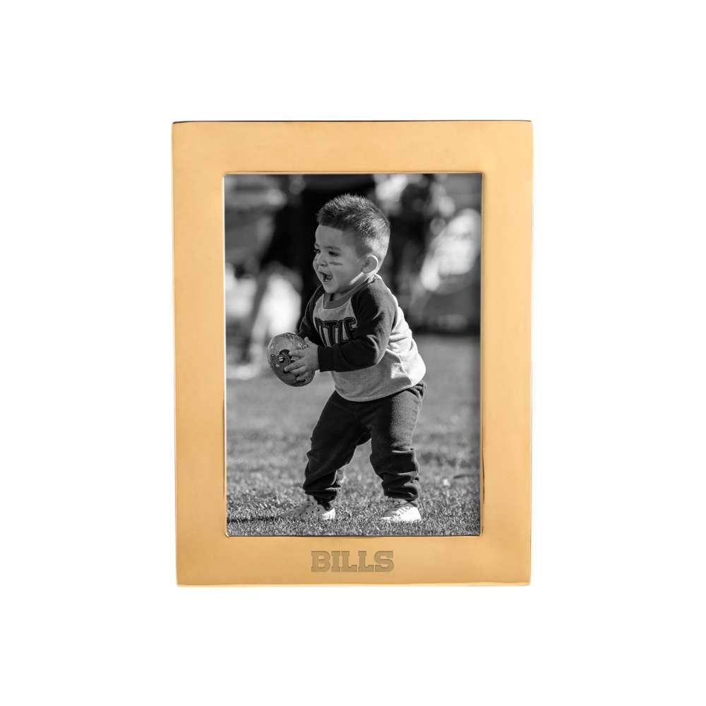 Brass Buffalo Bills Crate & Barrel NFL Signature Tabletop Picture Frame featuring a broad brass-colored border around a black-and-white photo of a child carrying a football