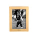 Brass Jacksonville Jaguars Crate & Barrel NFL Signature Tabletop Picture Frame with a simple brass border holding a black-and-white outdoor photo of a child clutching a football