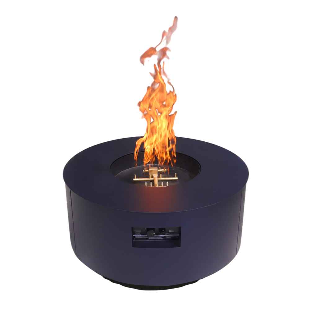 Bright flames shoot upward from a blue Warming Trends AON Steel Circular Fire Pit Table, with the burner and control panel visible