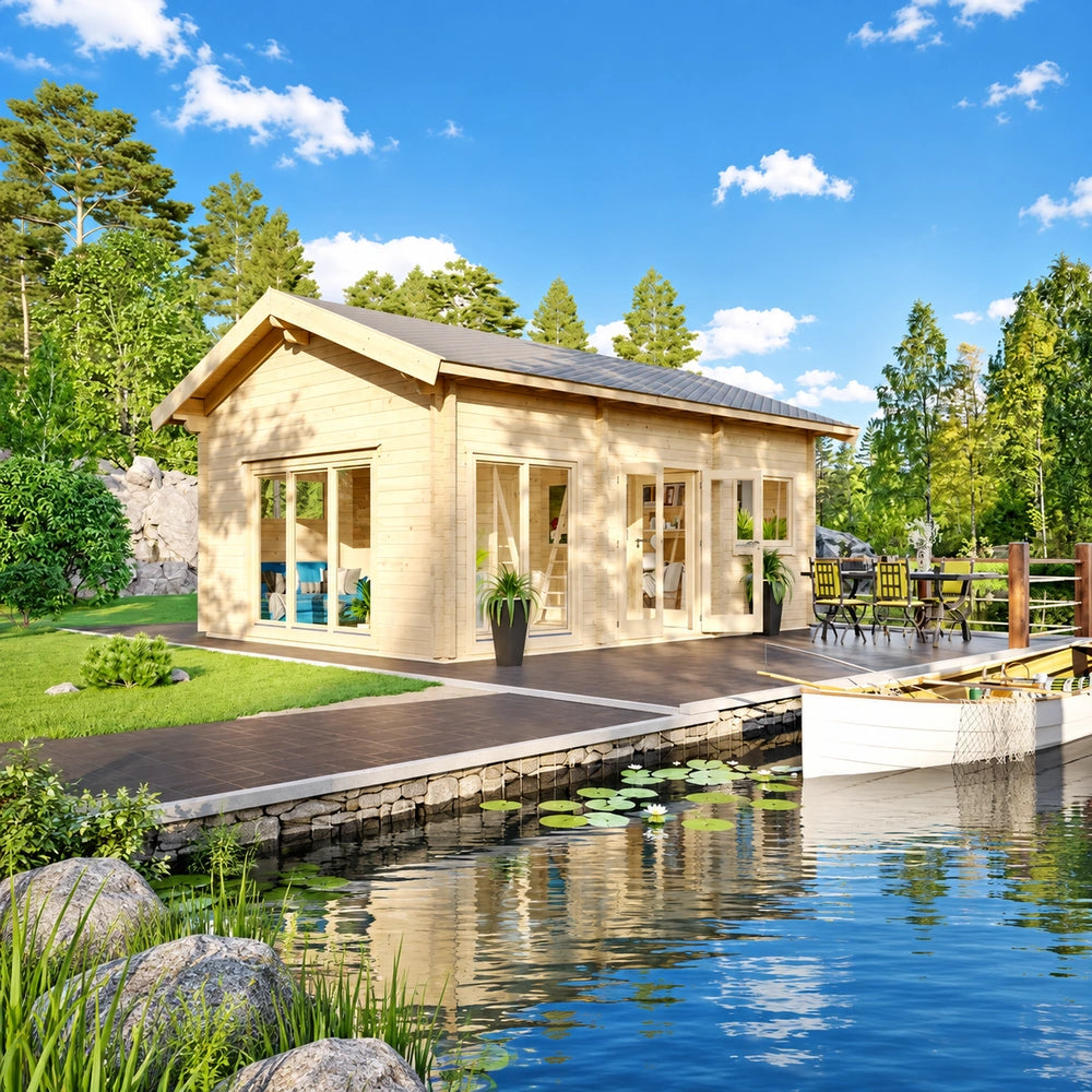 Britt 44 wooden garden room beside a landscaped pond, with expansive glass doors, a furnished deck and outdoor dining area.