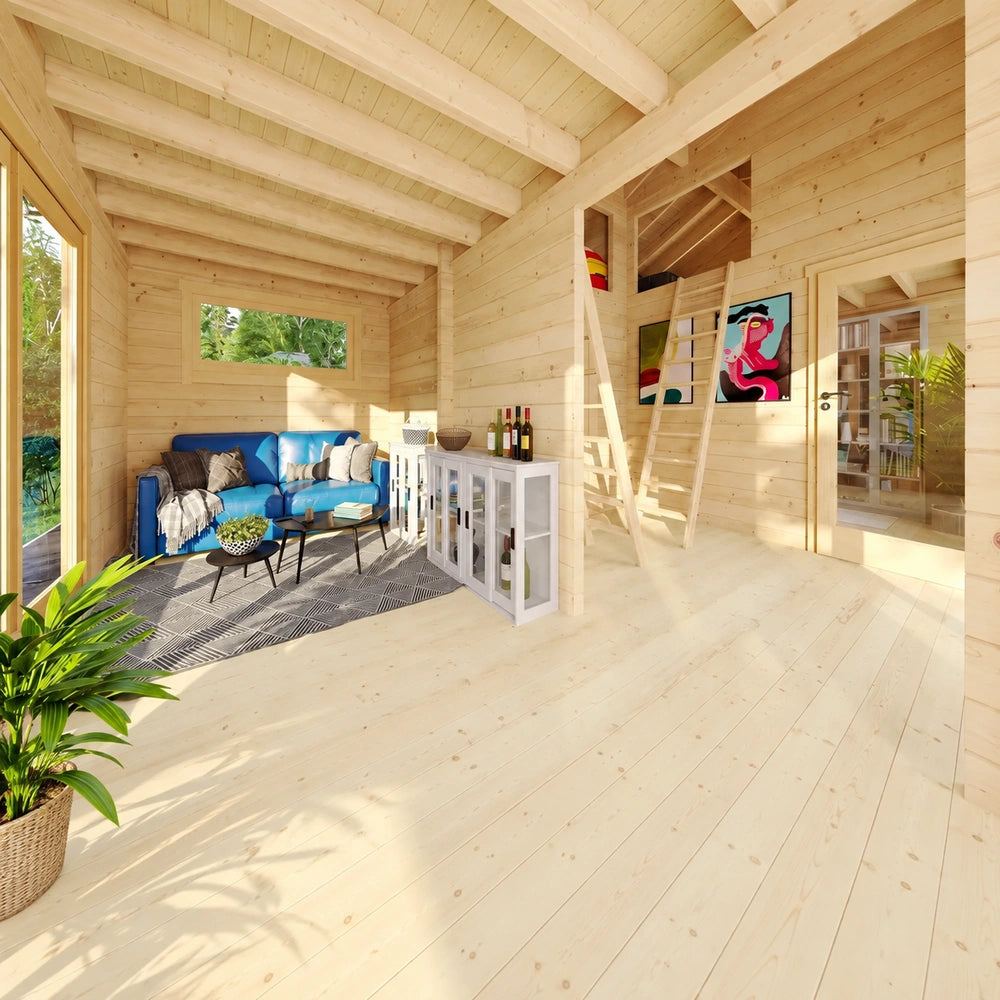 Britt 44 wooden garden room interior with a blue sofa, patterned rug, storage cabinet and ladder leading to the furnished loft.