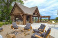 Brookside Timber Frame Denalivue Pavilion offers a complete outdoor experience with a fire pit area, comfortable lounge chairs, a poolside retreat, and a breathtaking countryside view
