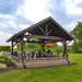 Brookside Timber Frame Timber Retreat Pavilion stands tall with a sloped wooden roof