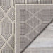 Cack corner of Couristan Liguria Indoor/Outdoor Rug - Rapallo/Pebble folded over, revealing its woven texture