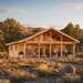 Caroline 90 entertainment bar with adults socializing among Wyoming’s golden Cody foothills.