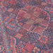 Central medallion and geometric motifs of Momeni Afshar Indoor Rug - AFS10 Navy showcasing its rich red, blue, and cream details
