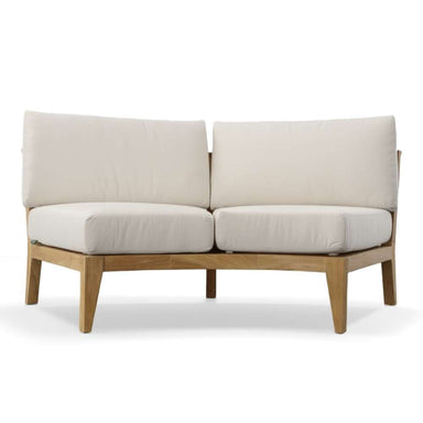 Clean front view of Westminster Teak Kafelonia Sofa Sectional shows plush off-white cushions resting on a warm teak wood base against a white background