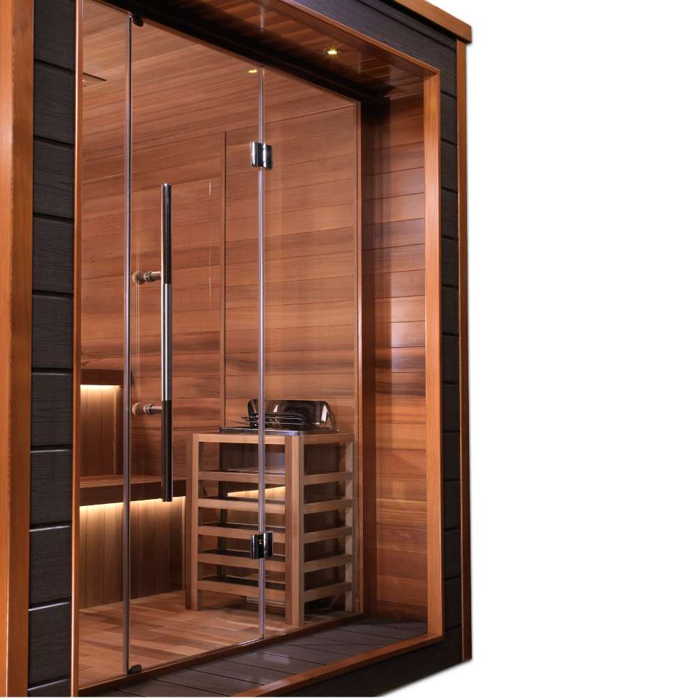 Close angle of Golden Designs Bergen 6 Person Outdoor-Indoor Traditional Sauna showing the glass doors, cedar interior and guarded stove inside