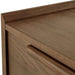 Close-up detail of Crate & Barrel Tate Walnut Lateral File Cabinet highlighting its smooth walnut grain and integrated drawer pull