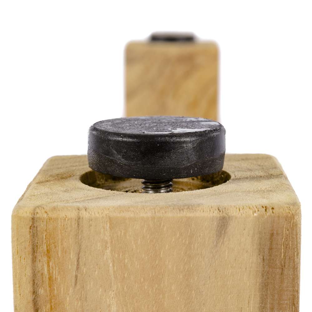 Close-up detail of Westminster Teak 6ft Horizon Teak Backless Bench shows a round adjustable foot pad underneath the wooden leg