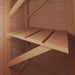 Close-up inside a wooden shed highlights the smooth slatted design of the Outdoor Living Today 8ft Western Red Cedar Shed Shelves (Set of 3) mounted securely to the wall