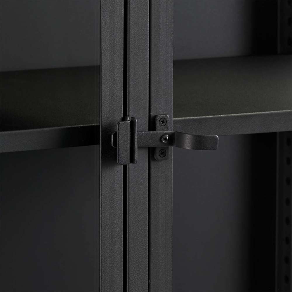 Close-up of Crate & Barrel Casement 32" Black Storage Cabinet highlights the black metal latch securing the glass cabinet doors