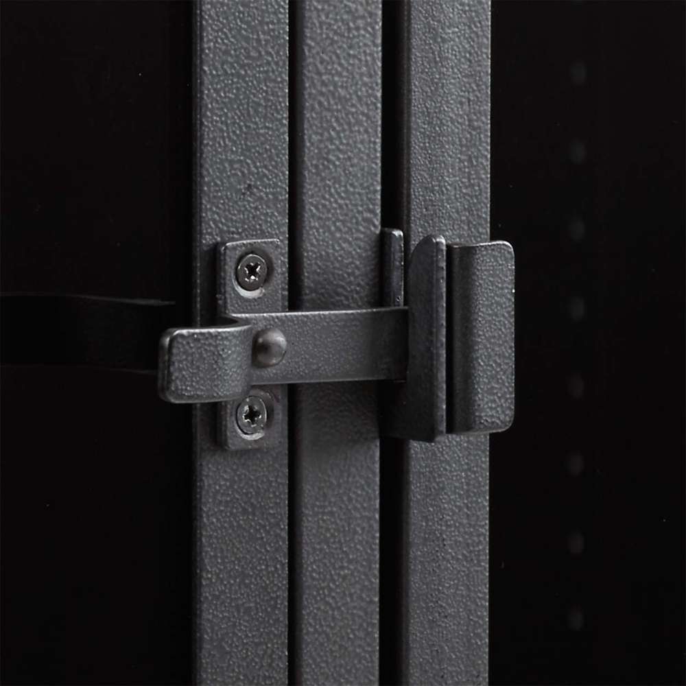 Close-up of Crate & Barrel Casement 66" Black Credenza highlights its black metal latch and glass cabinet door hardware