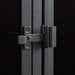 Close-up of Crate & Barrel Casement 66" Black Credenza highlights its black metal latch and glass cabinet door hardware