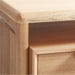 Close-up of Crate & Barrel Elias 66" Natural Elm Wood Desk with File Cabinet highlights its rounded corners, solid wood frame, and natural elm finish