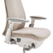 Close-up of Crate & Barrel Haworth Fern Upholstered Beach Office Chair seat, adjustable armrests, and under-seat adjustment controls