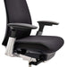 Close-up of Crate & Barrel Haworth Fern Upholstered Coal Office Chair seat, adjustable armrests, and under-seat adjustment controls