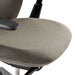 Close-up of Crate & Barrel Haworth Soji Upholstered Clay and Mesh Office Chair highlights the soft upholstered seat with rounded edges