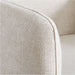 Close-up of Crate & Barrel Jens Plush Ivory Office Chair highlighting the textured ivory fabric upholstery and tailored stitching details