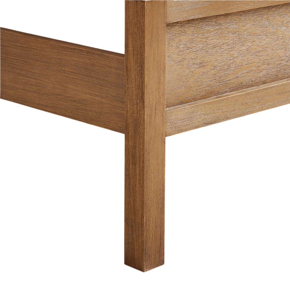 Close-up of Crate & Barrel Keane Solid Driftwood King Bed highlighting the wood grain and sturdy footboard corner
