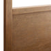 Close-up of Crate & Barrel Keane Solid Driftwood King Canopy Bed highlights the solid wood headboard with a clean, modern driftwood finish