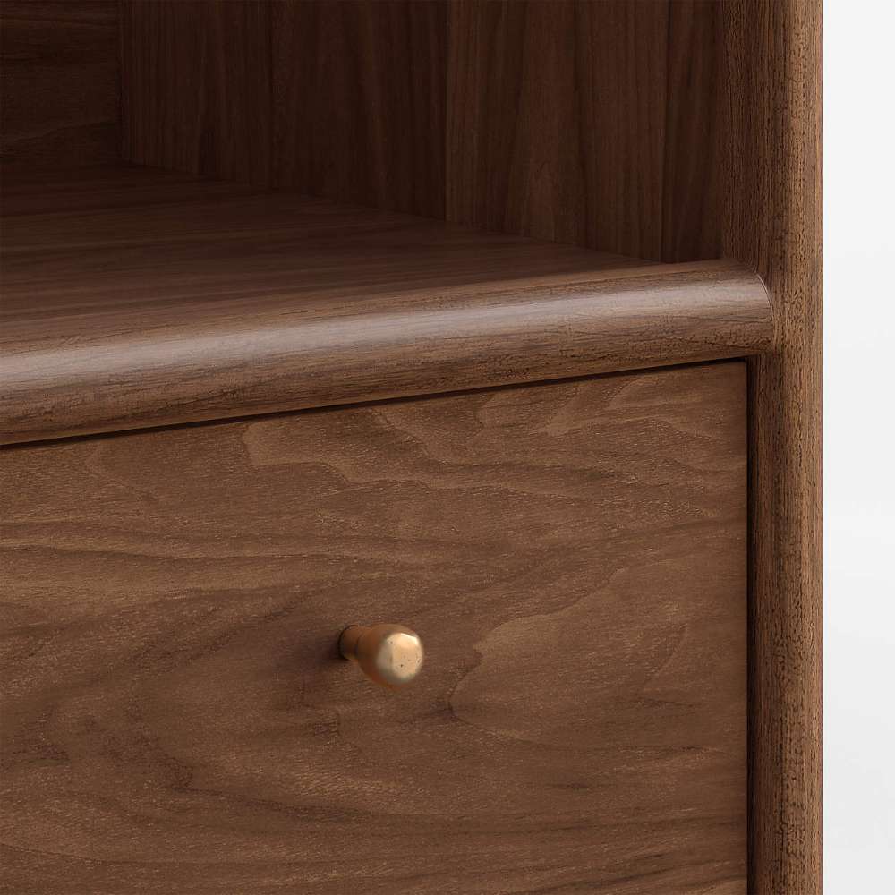 Close-up of Crate & Barrel Lafayette 36" Walnut Open Storage Bookcase highlighting its rounded wood edges and round brass drawer knob