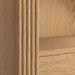 Close-up of Crate & Barrel Siena 34" Natural Wood 4-Shelf Storage Bookcase with Drawer highlighting natural wood grain and fluted accents