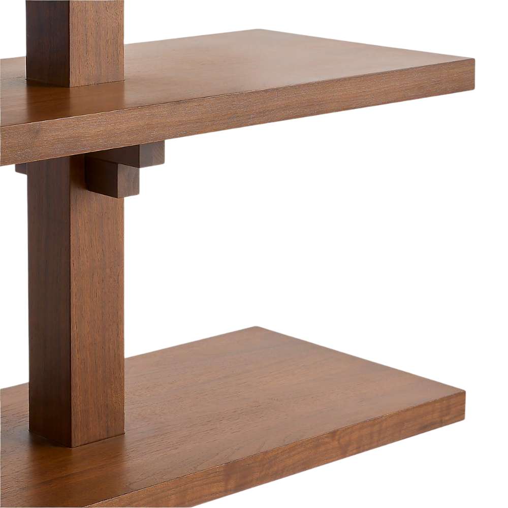 Close-up of Crate & Barrel Steppe 68" Walnut Storage Bookcase Room Divider showcases the smooth walnut shelves and sturdy vertical supports