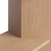 Close-up of Crate & Barrel Terrazza 38" Natural Solid Oak Wood 2-Shelf Storage Bookcase Cabinet showing the natural oak wood grain and shelf detail