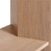 Close-up of Crate & Barrel Terrazza 38" Natural Solid Oak Wood 5-Shelf Storage Bookshelf highlights its smooth natural oak grain and sturdy shelf construction