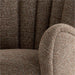 Close-up of Crate & Barrel Wright Wingback Upholstered Office Chair showing the textured brown fabric, padded armrest, and channel-tufted backrest