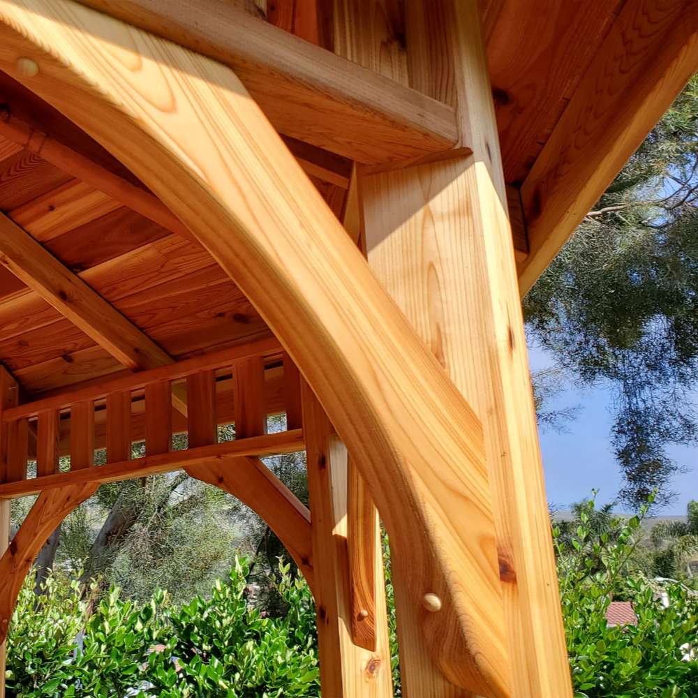 Close-up of Outdoor Living Today Western Red Cedar Octagon Bayside Gazebo shows smooth cedar wood grain and strong angled support beams