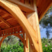 Close-up of Outdoor Living Today Western Red Cedar Octagon Bayside Gazebo shows smooth cedar wood grain and strong angled support beams