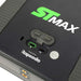 Close-up of SKYTRAK ST MAX Launch Monitor showing two USB ports, a protective cover, power button, and mounting holes