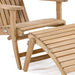 Close-up of Westminster Teak Adirondack Lounger and Ottoman showing the slatted teak seat and matching curved footrest on a white background