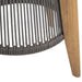 Close-up of Westminster Teak Luna Round Side Table highlights the tightly woven gray rope detailing around the base next to a sturdy wooden leg