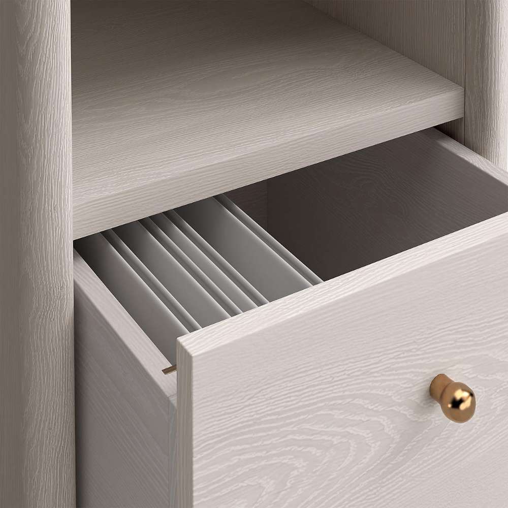 Close-up of an open drawer on Crate & Barrel Lafayette 64" Whitewashed Desk with Outlets with file dividers inside