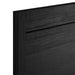 Close-up of headboard on the Crate & Barrel Keane Black Solid Wood Queen Bed showing its textured black wood finish and simple design