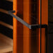 Close-up of the black finish towel bar handle against the glass and warm wood of Golden Designs 2025 Reserve Edition 3 Person Full Spectrum Sauna with Himalayan Salt Bar