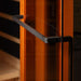 Close-up of the black finish towel bar handle against the glass and warm wood of Golden Designs Reserve Edition 4 Person Full Spectrum Sauna with Himalayan Salt Bar
