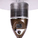 Close-up of the bronze burner housing on Outdoor Order Halo Traditional Heater shows the mesh emitter screen, logo badge, and control knob