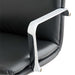 Close-up of the chrome armrest and black faux leather seat on Crate & Barrel Smythe Black Faux Leather Office Chair