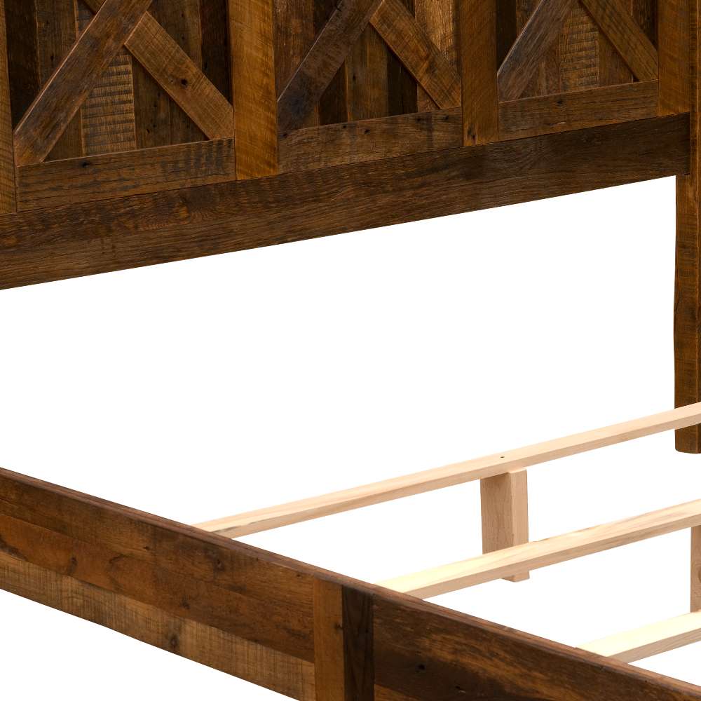 Close-up of the rustic X-pattern headboard on Fireside Lodge Barnwood Barndoor Bed made from thick reclaimed woo