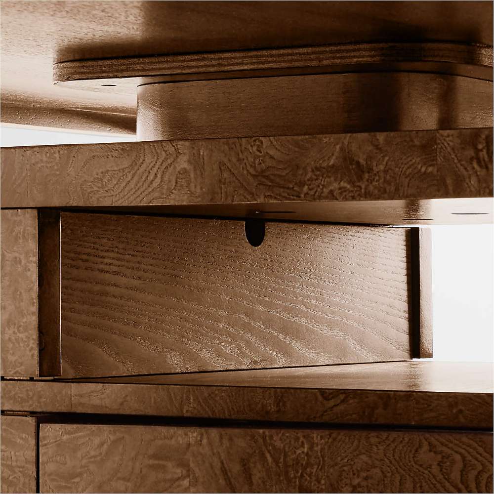 Close-up of the swivel drawer mechanism on Crate & Barrel Greye 60" Burl Wood Desk with Swivel Drawers