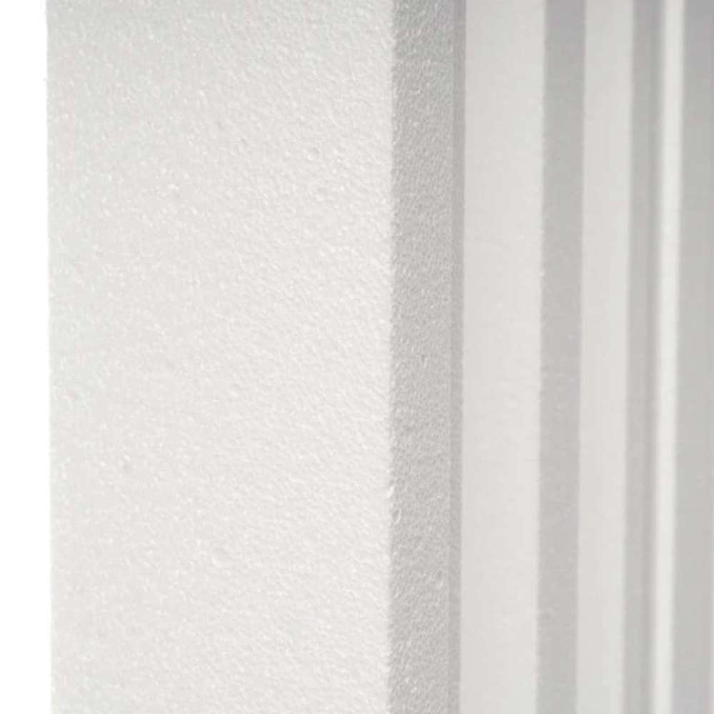 Close-up of the textured surface and deep grooves of a white GIK Acoustics GridFusor™ Diffuser acoustic panel