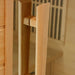 Close-up of the vertical wood door handle on the glass door of Golden Designs Maxxus 3 Person Low EMF Far Infrared Corner Sauna in Hemlock