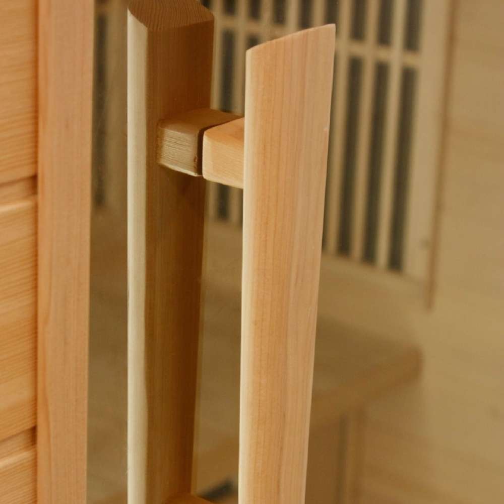 Close-up of the vertical wood door handle on the glass door of Golden Designs Maxxus 3 Person Low EMF Far Infrared Sauna in Hemlock