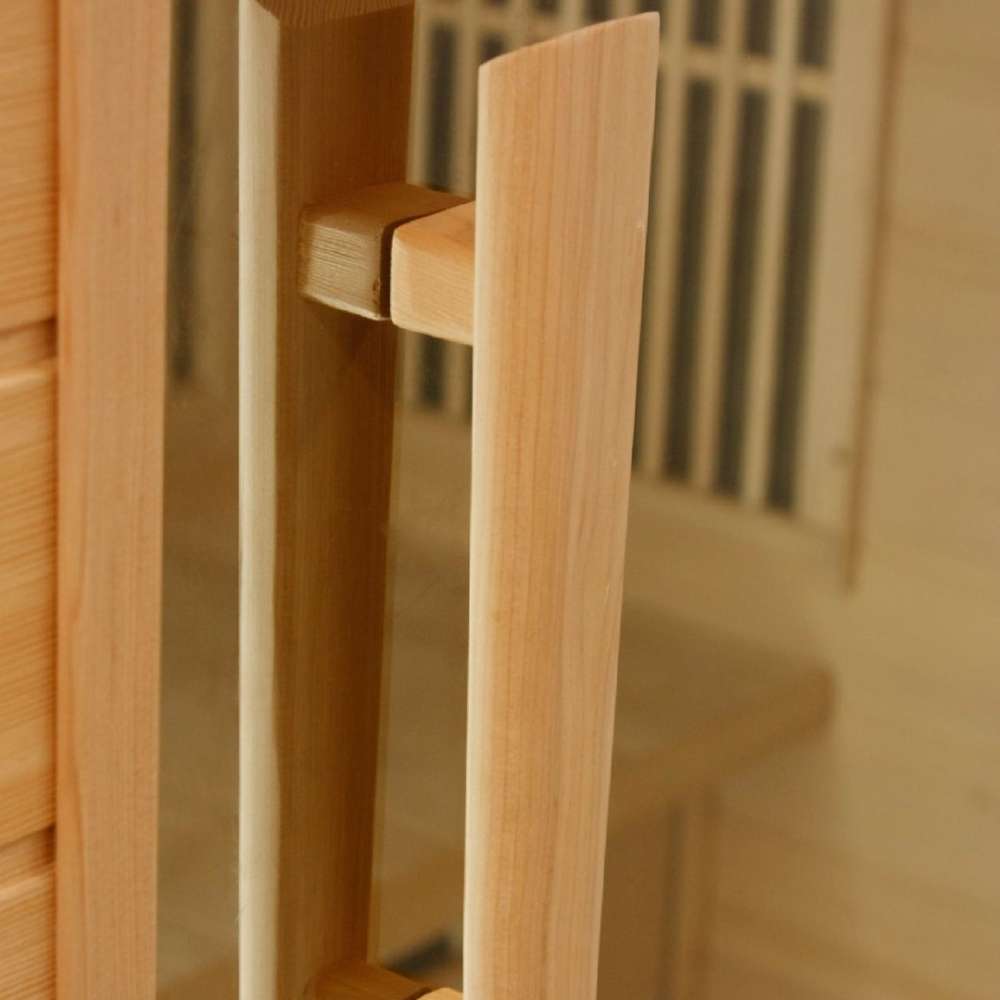 Close-up of the vertical wood door handle on the glass door of Golden Designs Maxxus 4 Person Low EMF Far Infrared Sauna in Hemlock
